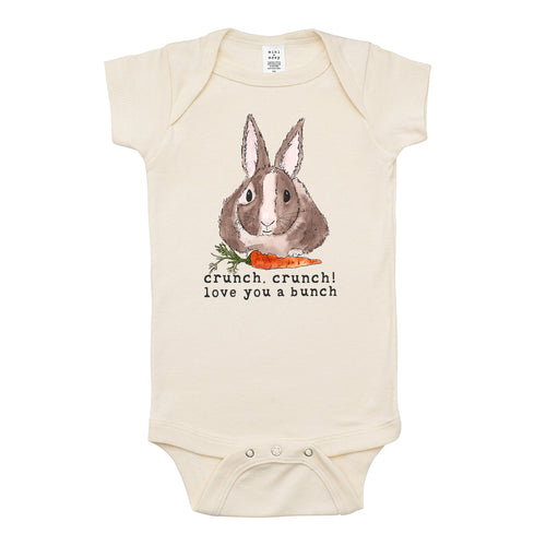 Sustainably made, organic baby and children's apparel that gives back. Organic baby clothes, bodysuit, snappie with bunny.